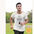 Christian t-shirt featuring the phrase "Heads Up - Jesus Is Coming Soon" referencing Luke 21:25-28 printed on the front.