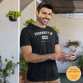 Christian t-shirt featuring the phrase “Property of God” with a reference to 1 Corinthians 6:16-20 printed on the front.