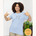 Christian t-shirt featuring an illustration inspired by Matthew 9:20-22 showing the woman reaching for the robe of Jesus, printed on the front.