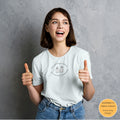 Christian t-shirt featuring an illustration of Jesus sitting across a table from a woman, symbolizing a personal relationship with Jesus, printed on the front.